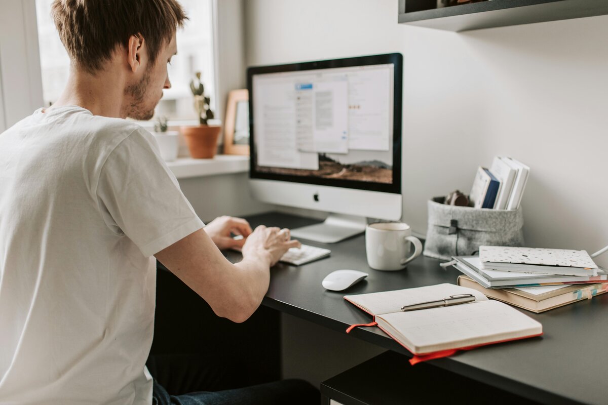 man on computer