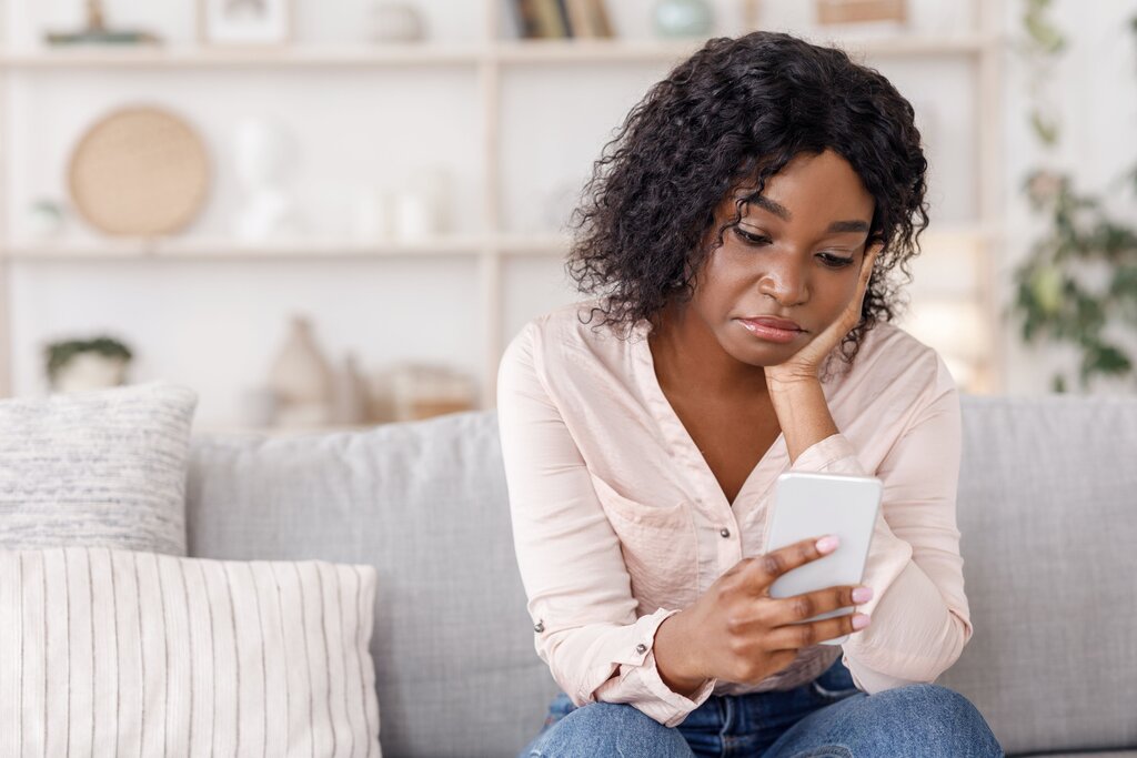 woman checking her phone