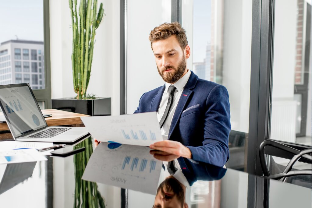 Businessmen working in bright modern office
