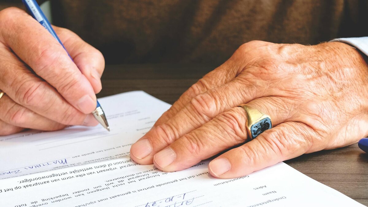 signing up papers