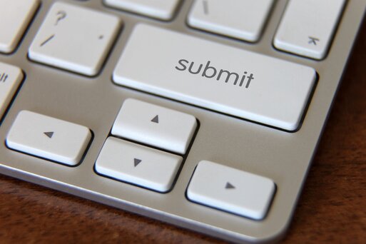 Keyboard submit key and arrow keys close-up view