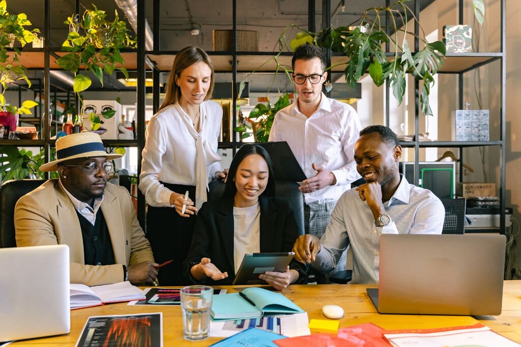 Diverse Business team discussing reports and financial planning during a meeting
