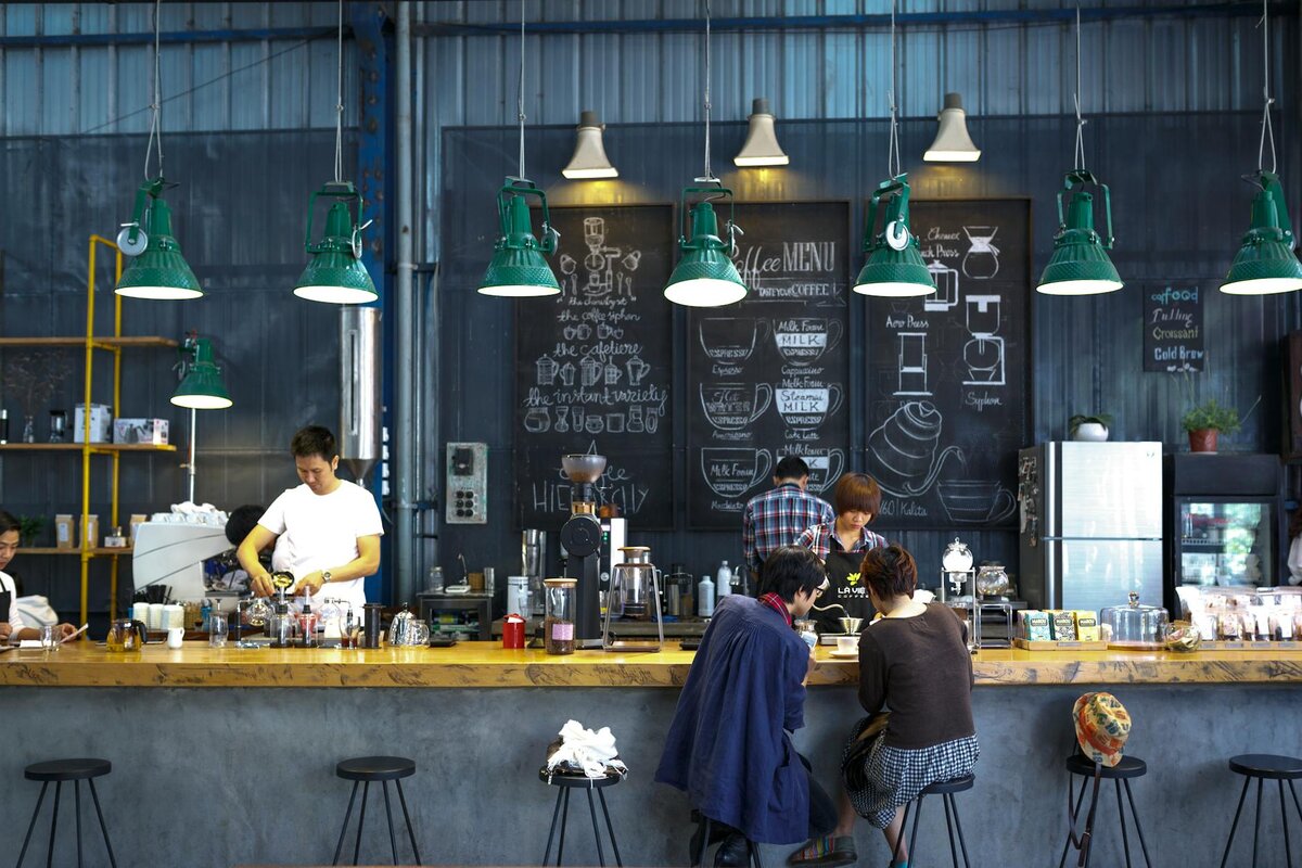 coffee shop with employees and customers 