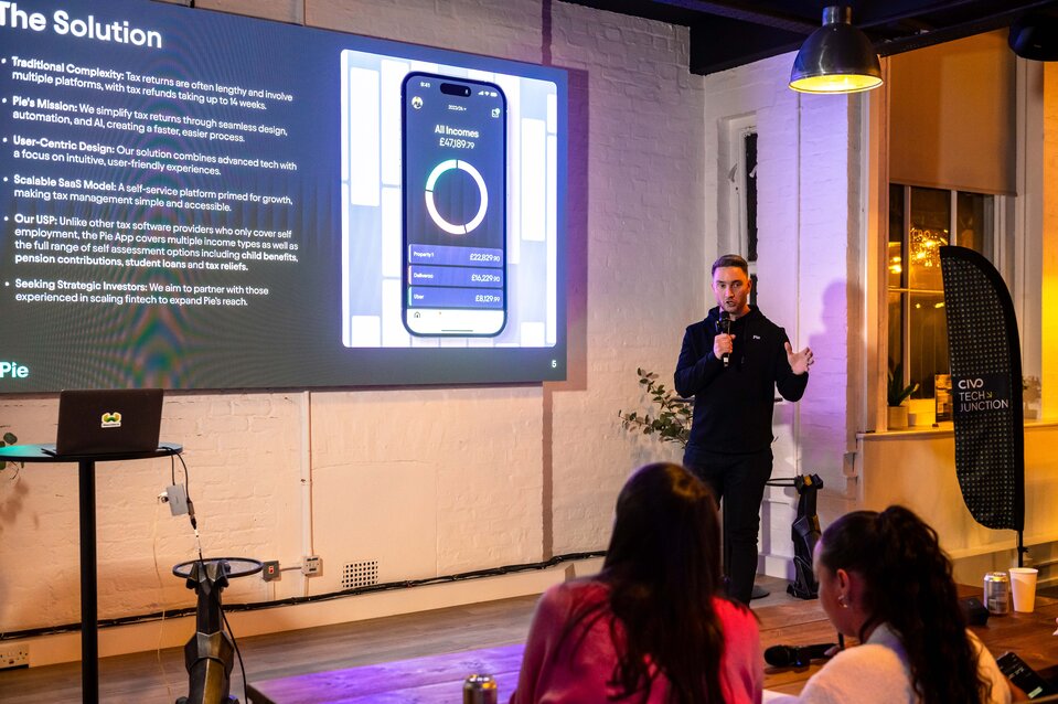 Pie CEO Tommy McNally presenting the tax app solution at an event