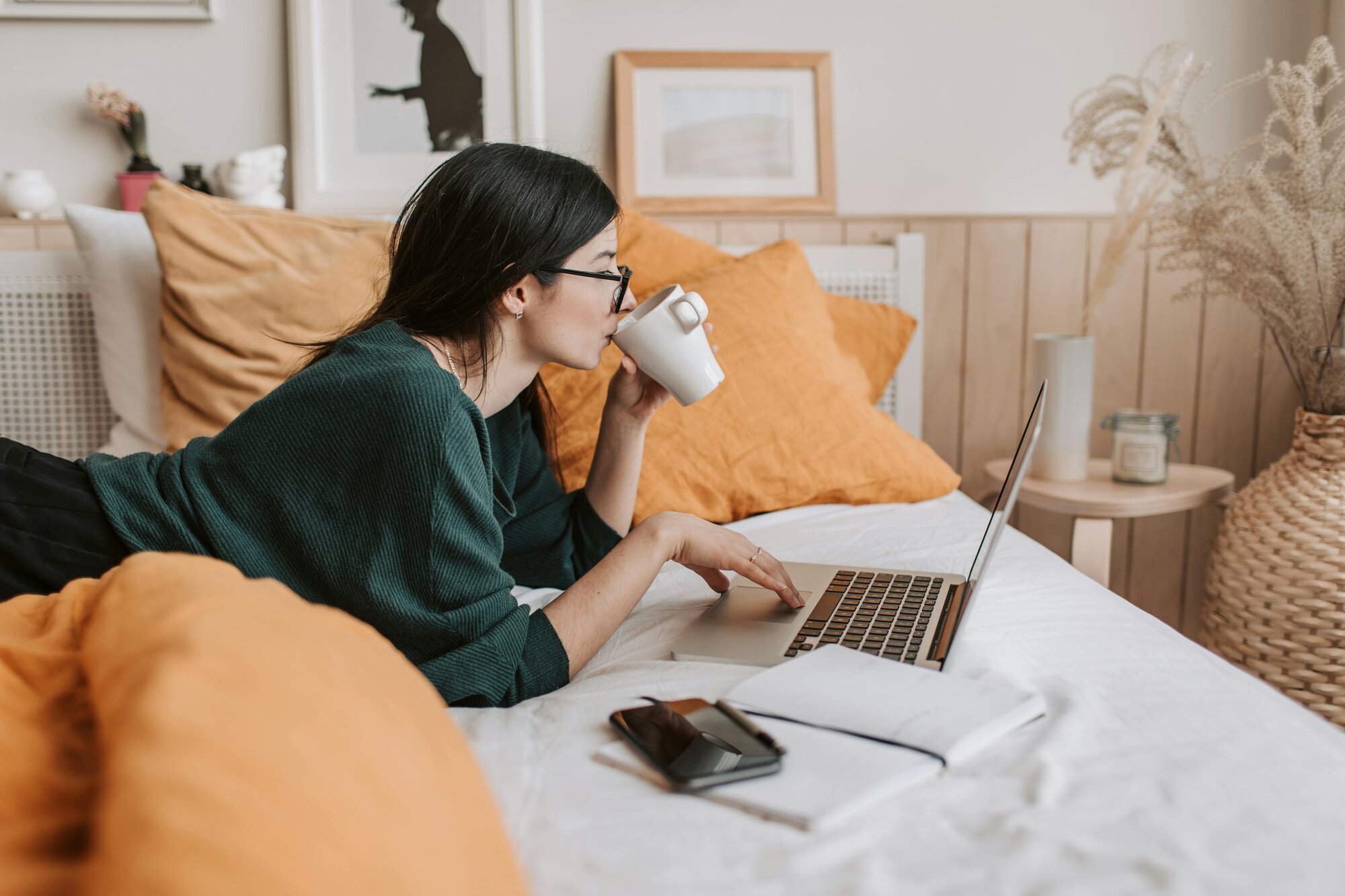 Woman watching something on laptop