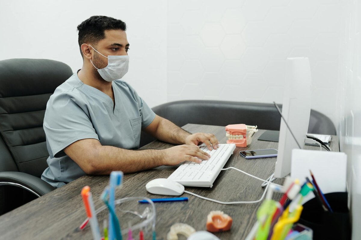 Man focused in his computer checking about UK tax