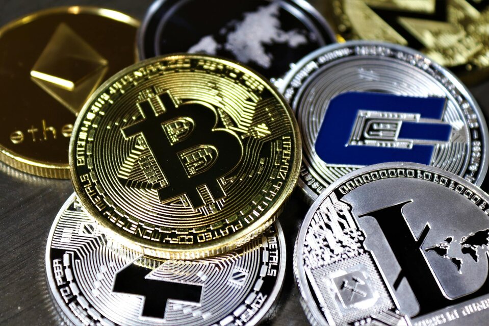 "Cryptocurrency coins including Bitcoin and Ethereum related to crypto tax
