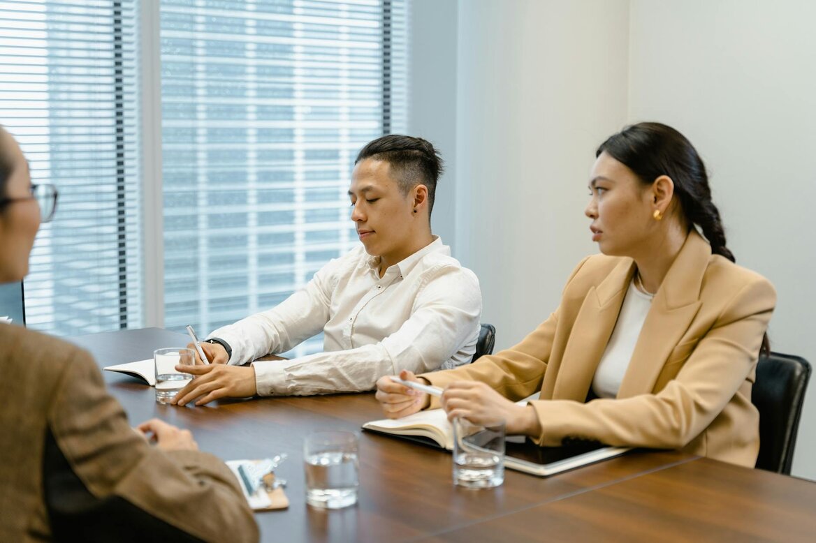Professionals reviewing automated financial reports generated by Pie Tax AI software.