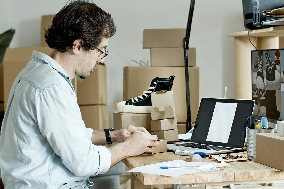 man working on his laptop
