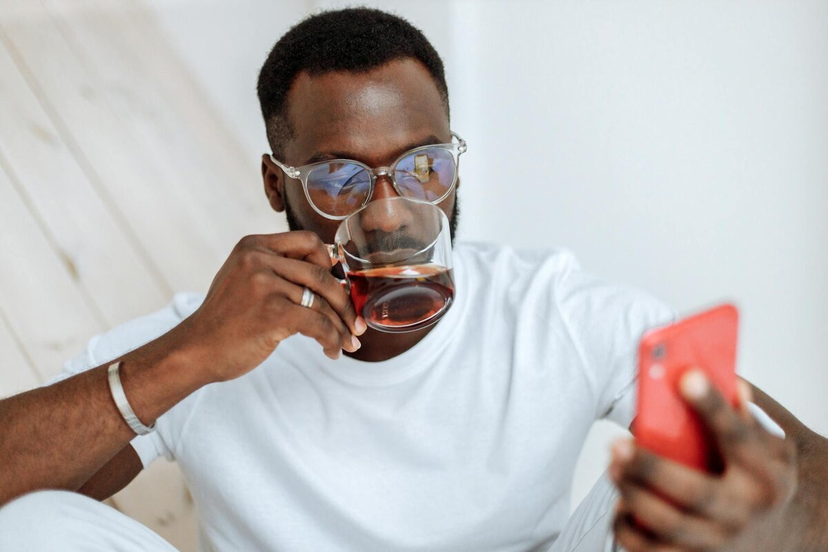 Man checking his monthly update report in his phone