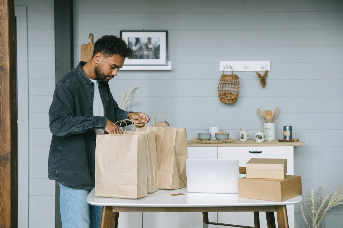 man checking his shopping bags 